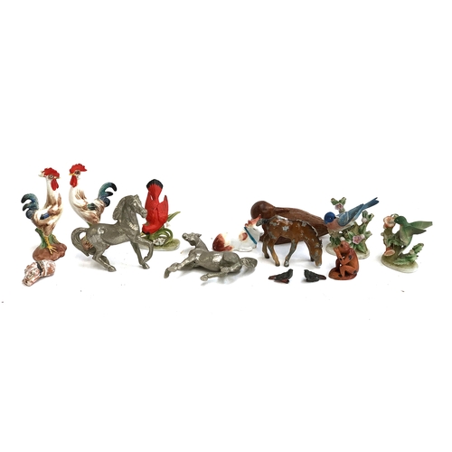 303 - A mixed lot of animal figurines to include cold painted horse and birds; metal horses; Italian ceram... 