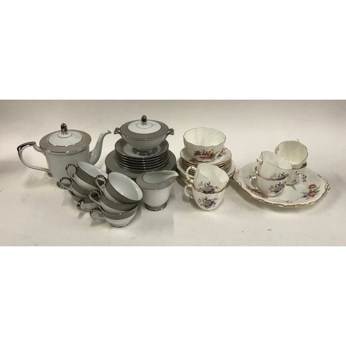 308 - A Royal Crown Derby part tea set; together with a further white and grey Japanese tea set