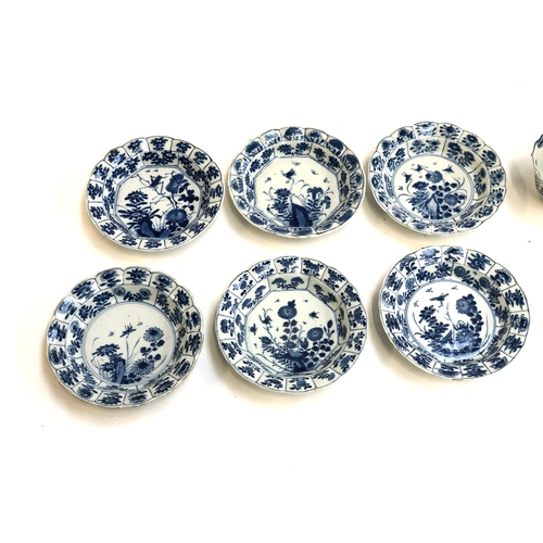 323 - A collection of six Chinese export blue and white Kraak saucers, each approx. 13cmD; together with s... 