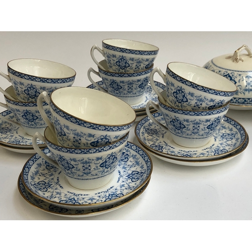 327 - A Wedgwood part tea service comprising teacups, saucers, muffin dish, sugar bowl etc