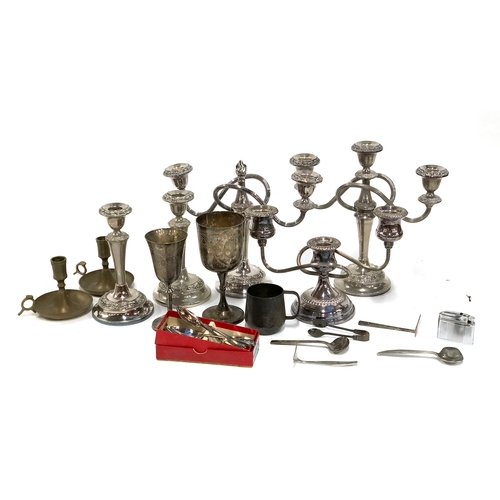 497 - A mixed lot of silver plate to include three arm candlesticks; brass candlesticks; Streamline lighte... 