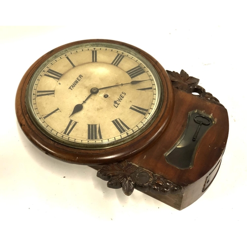 640 - An early 20th century wall clock from a Police station, by Tanner of Lewes, with Roman numerals, 11