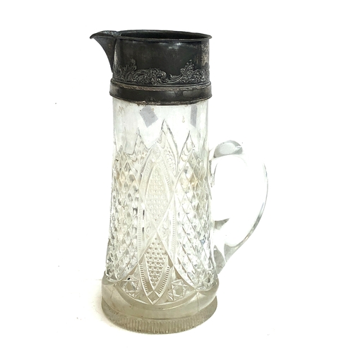 642 - A cut glass and plated jug, 29cmH