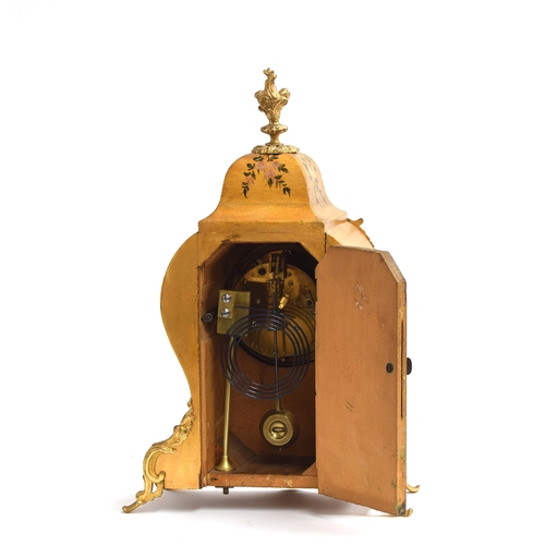 103 - A French giltwood and ormolu mantel clock, in the manner of Vernis Martin, of bombe form, the enamel... 