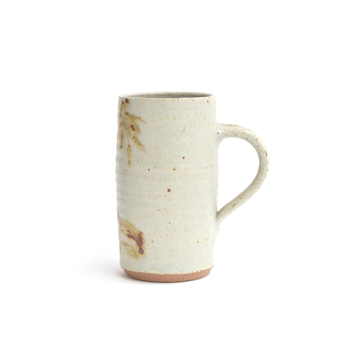 339 - Henry Hammond (1914-1989), studio pottery stoneware tankard with tree design, makers mark HH, 15cm h... 