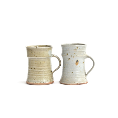 346 - Gustave Tiffoche (French, 1930-2011), studio pottery tankards, each signed to base, one with pottery... 