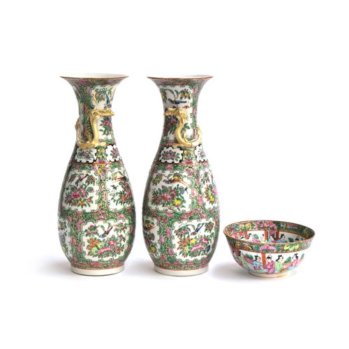 194 - A pair of 19th century Chinese export famille rose vases, each with a gilt dragon, 31cm high (repair... 