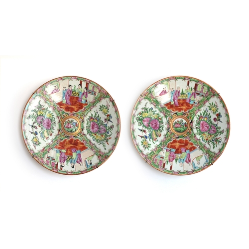 195 - A pair of Chinese export famille rose chargers, 28cm diameter