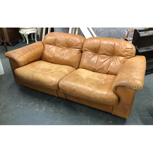 1149 - A pair of modern tan leather two seater sofas, 184cm wide, 90cm deep