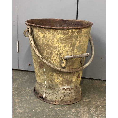 1324 - An antique fire bucket with iron loop handle, 43cmH