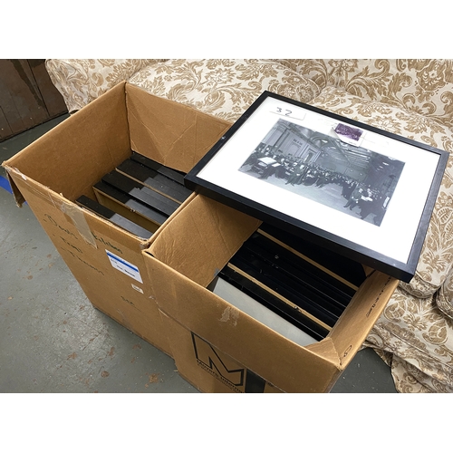 1330 - 22 large black and white framed photographs in two boxes, each frame approx. 55x45cm overall