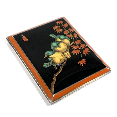 62 - An Art Deco likely Austrian silver and enamel cigarette case in the Japanese taste, the black and re... 