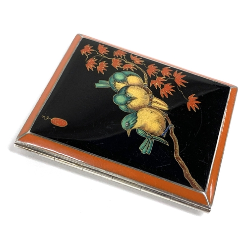 62 - An Art Deco likely Austrian silver and enamel cigarette case in the Japanese taste, the black and re... 