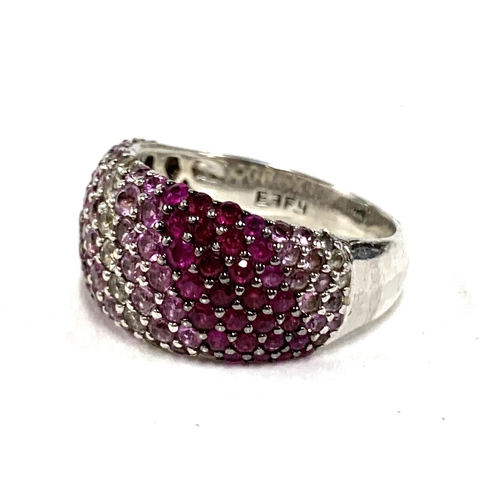 36 - An Effy 925 sterling silver ring pave set with rubies and pink and white sapphires, size Q 1/2, 6.2g