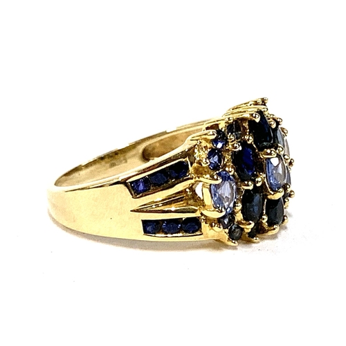 40 - A 9ct gold cluster ring set with sapphires and blue topaz, size P 1/2, 5.3g