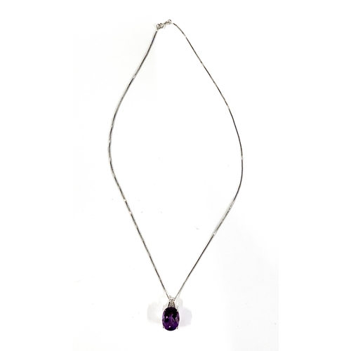 42 - A 14ct white gold mounted amethyst pendant, with a diamond set bail, the amethyst measuring 1.5x1.2c... 