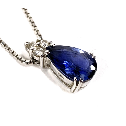 44 - An 18ct white gold mounted sapphire and diamond pendant, the pear shaped sapphire measuring approx. ... 