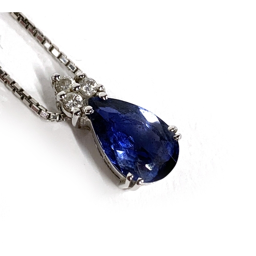 44 - An 18ct white gold mounted sapphire and diamond pendant, the pear shaped sapphire measuring approx. ... 