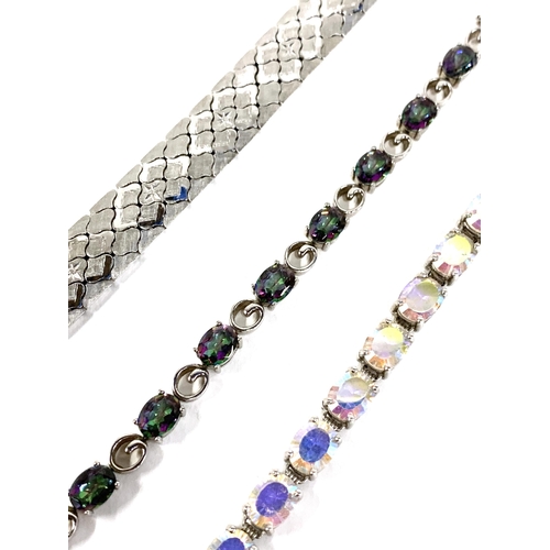 49 - A silver bracelet, 32g; together with two 925 silver and aurora borealis crystal bracelets, gross we... 