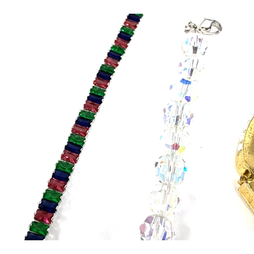 51 - A quantity of Swarovski jewellery together with Swarovski pens