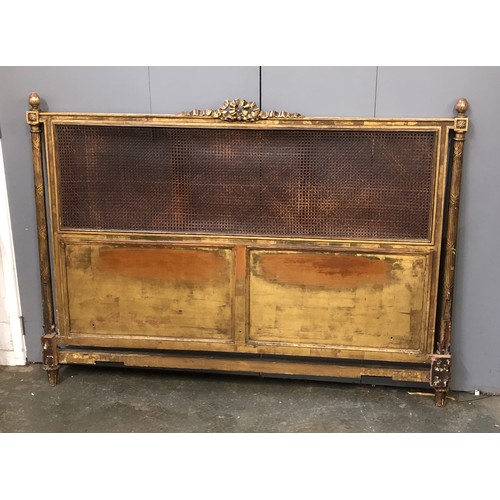 1329 - A caned and gilt gesso kingsize headboard, 168cmW, 120cmH