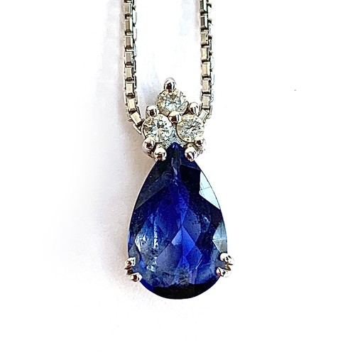 44 - An 18ct white gold mounted sapphire and diamond pendant, the pear shaped sapphire measuring approx. ... 