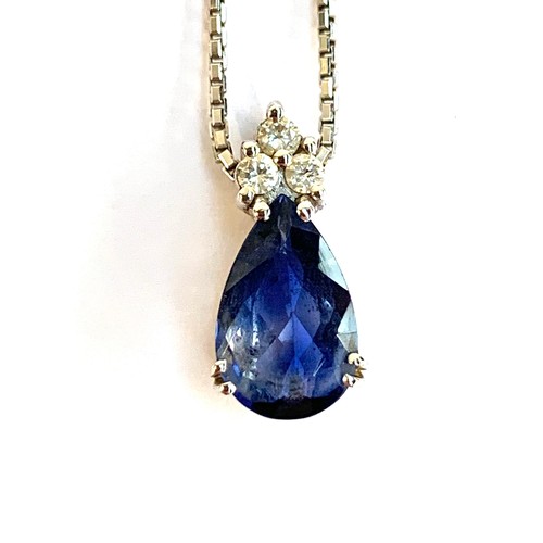 44 - An 18ct white gold mounted sapphire and diamond pendant, the pear shaped sapphire measuring approx. ... 