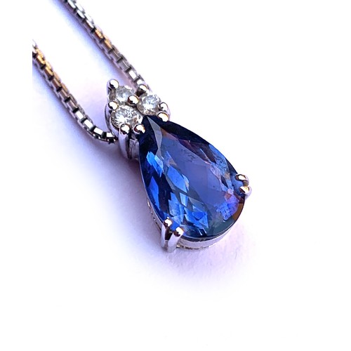 44 - An 18ct white gold mounted sapphire and diamond pendant, the pear shaped sapphire measuring approx. ... 