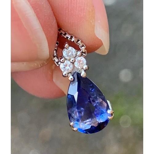 44 - An 18ct white gold mounted sapphire and diamond pendant, the pear shaped sapphire measuring approx. ... 