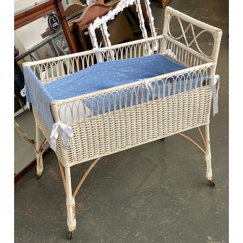 1335 - A white painted wicker cot, 81x48x87cmH