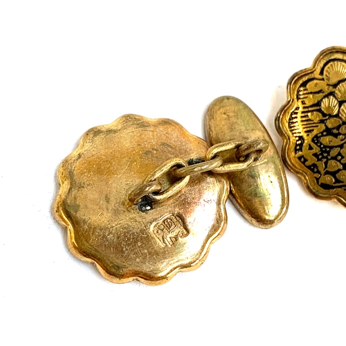 8 - A pair of Japanese yellow metal damascene cufflinks, the reverse stamped with an elephant, 2cmD