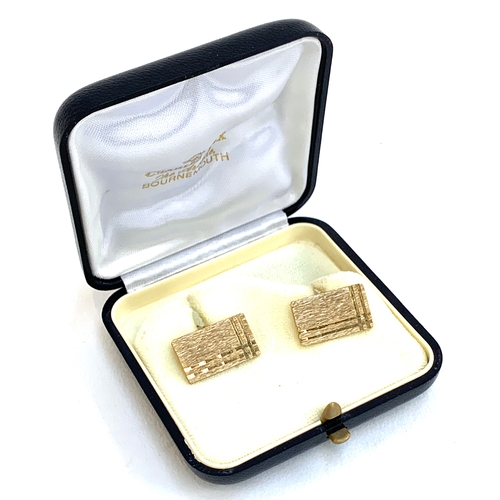 19 - A pair of 9ct gold cufflinks with engraved design, gross weight 9.7g