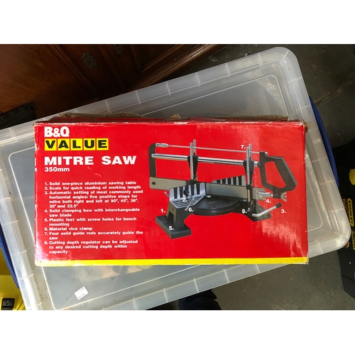 1338 - A Stanley toolbox containing tile cutter etc; together with a Mitre saw