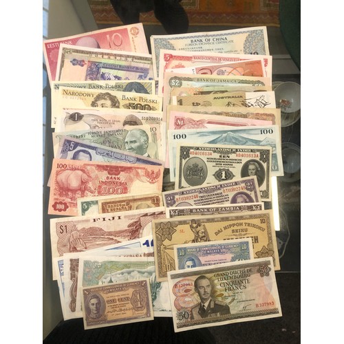 173 - A large quantity of World banknotes to include 500 Roubles 1912, Japan one thousand dollars, Burma, ... 