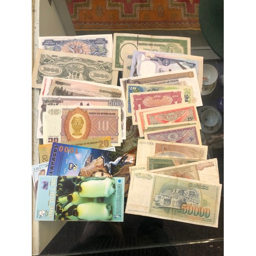 173 - A large quantity of World banknotes to include 500 Roubles 1912, Japan one thousand dollars, Burma, ... 