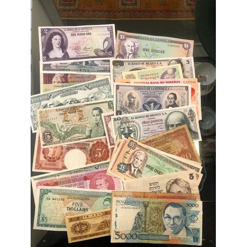 173 - A large quantity of World banknotes to include 500 Roubles 1912, Japan one thousand dollars, Burma, ... 