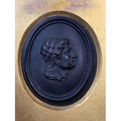 401 - Two late 18th century Wedgwood black basalt portrait cameo plaques, each 7.5x5.6cm, one depicting a ... 