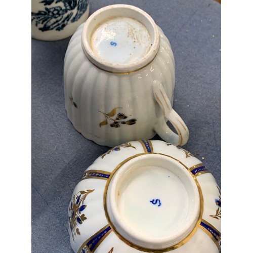 319 - A small collection of 18th and 19th century teacups, saucers and milk jugs, jug with Worcester cresc... 