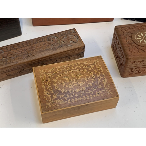 348 - A quantity of boxes to include jewellery boxes, carved and inlaid wooden boxes etc