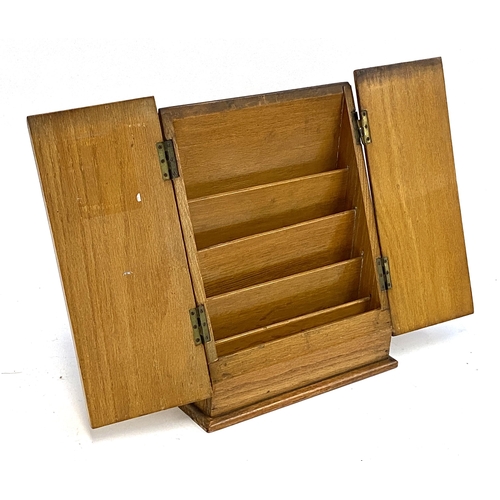 355 - A vintage Veteran Series stationery cabinet, one hinge af, bears label to reverse, 33cmH