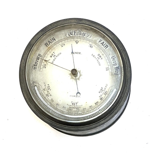 137 - A Victorian brass cased bulkhead barometer by Benzie, Cowes, Isle of Wight, 18cmD