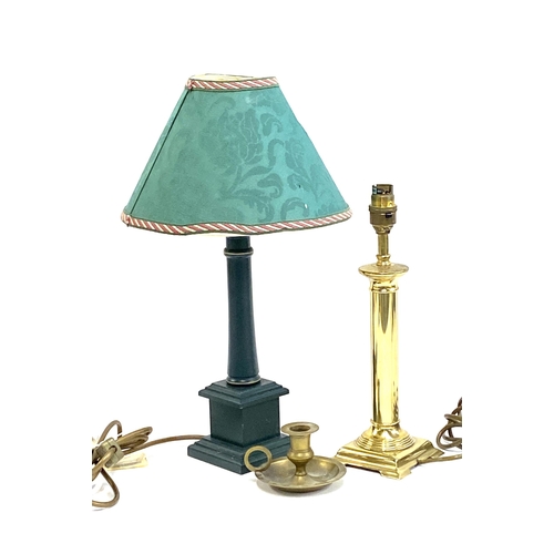 360 - A green painted table lamp with square plinth base, 43cmH; a gilt metal table lamp and a candlestick