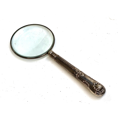 83 - A silver handled magnifying glass, 16cmL