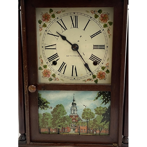 140 - An American mantel clock by Seth Thomas, the door glazed with a print of Independence Hall, Philadel... 