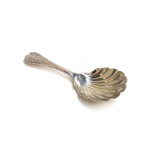 68 - A Victorian silver shell caddy spoon, London 1899, 0.45ozt