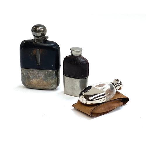 106 - A silver plated and leather bound glass hip flask by James Dixon & Sons, with bayonet fitted cap; to... 