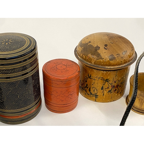 284 - A mixed lot to include lacquered pots, carved ebony Buddha, carved wooden daffodil plaque etc