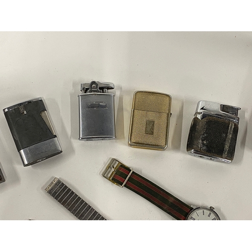 296 - A quantity of lighters, mainly Ronson, together with three wristwatches to include Timex