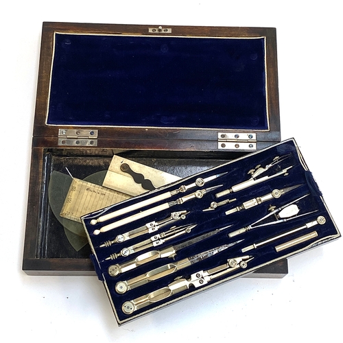 299 - A mahogany cased set of drawing instruments with blue velvet interior, 26cmW