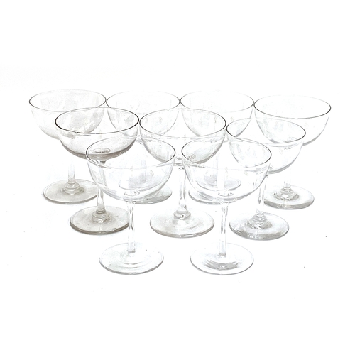 162 - A matched set of nine hand blown champaign cups, each approx. 12cm high